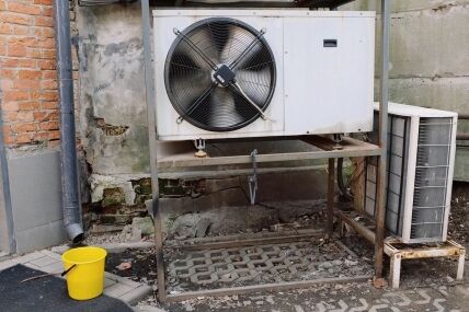 Air conditioner requiring HVAC maintenance